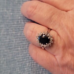 14kt oval natural 5 X 7mm sapphire and natural diamond ring